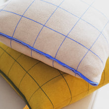 Load image into Gallery viewer, Modern cotton grid pillows in beige and mustard layered on neutral sofa
