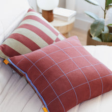 Load image into Gallery viewer, Wine red cotton throw pillow with blue grid pattern and bold wine and mint green color blocked cotton throw pillow styled on white sofa